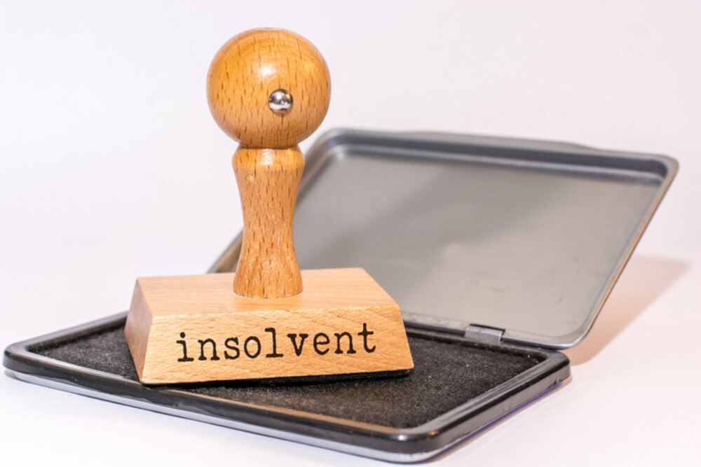 © Ralf Geithe iStock / Getty Images Plus Stempel mit Aufschrift „insolvent"
