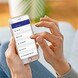 © Dormakaba Ein weißes Iphone mit einer Key-App wird bedient